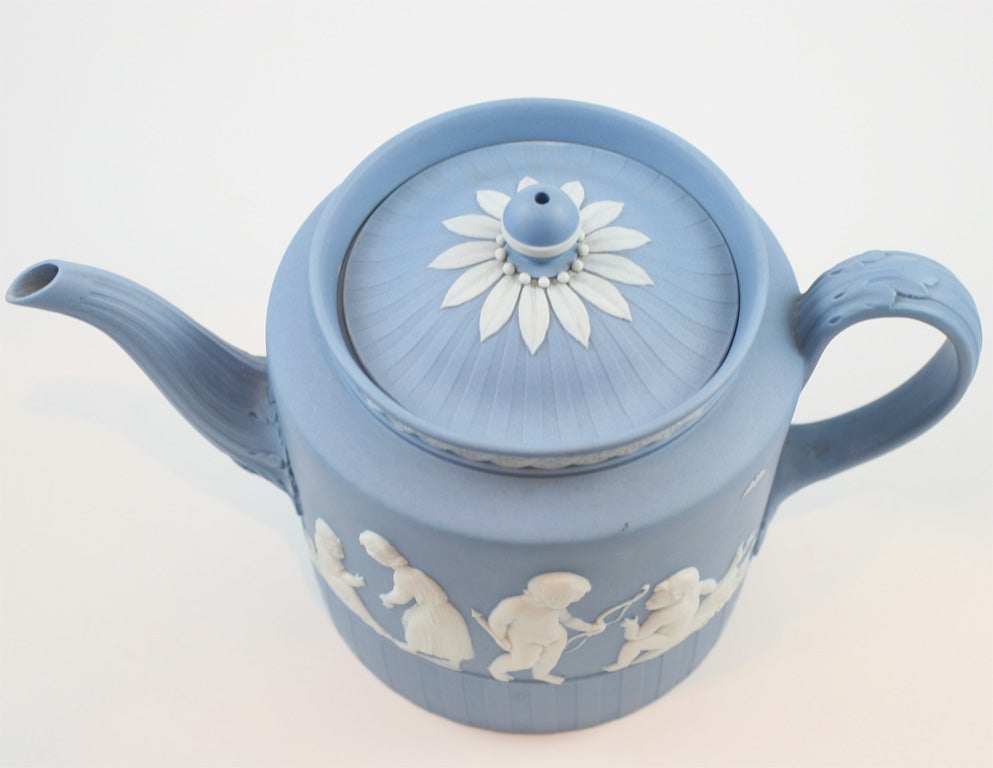 A rare and fine Wedgwood blue and white jasper teapot decorated with Lady Templetown designs, upper case mark