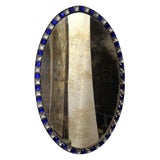 An Irish blue and clear studded mirror