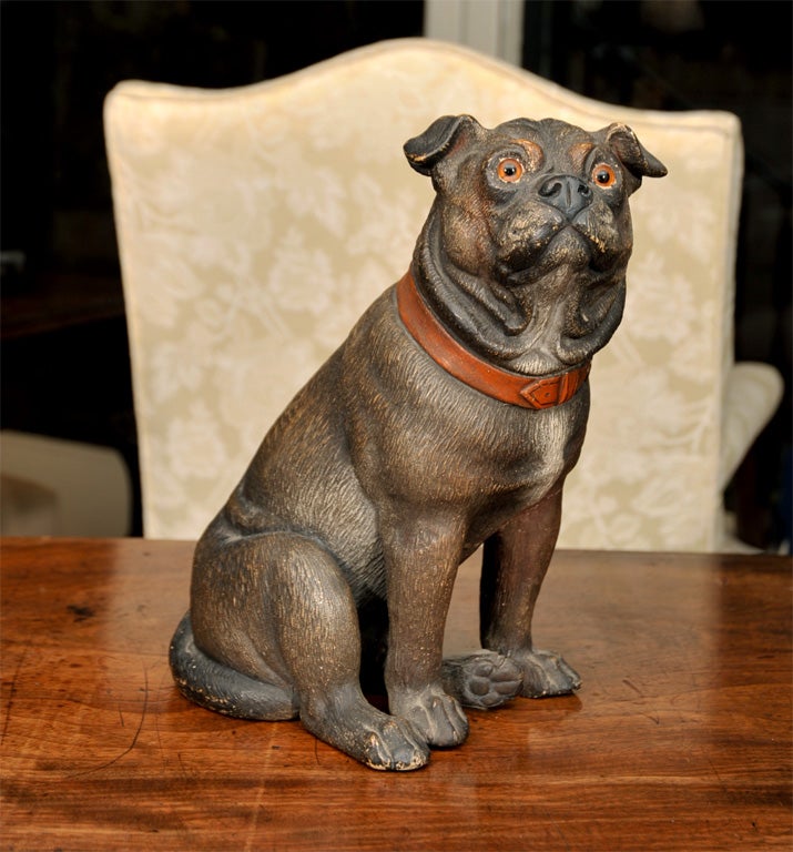 chien carlin assis en céramique du 19e siècle.