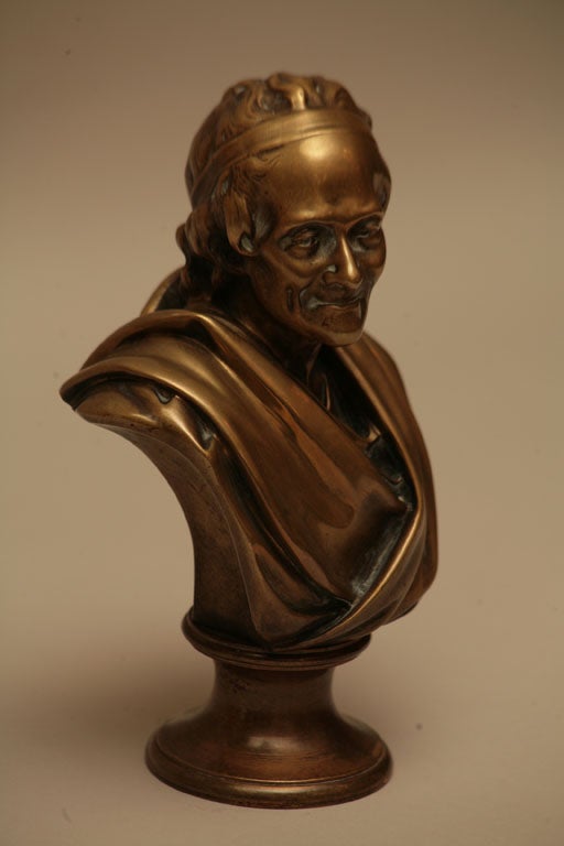 A BRONZE CASTING OF VOLTAIRE, DONE BY TIFFANY & CO.