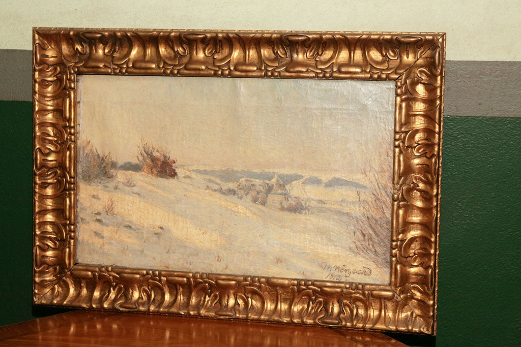 This fine oil painting on canvas of a winter snowy scene is signed and dated M. Norgoard 1912. This painting sold in as found contion is framed in its original frame. The painting could use a cleaning but is in good shape