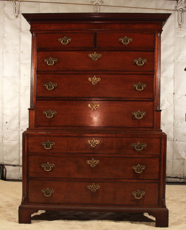 Beautiful robust 18th century Virginia Walnut chest-on-chest with original pierced brasses on bracket feet.