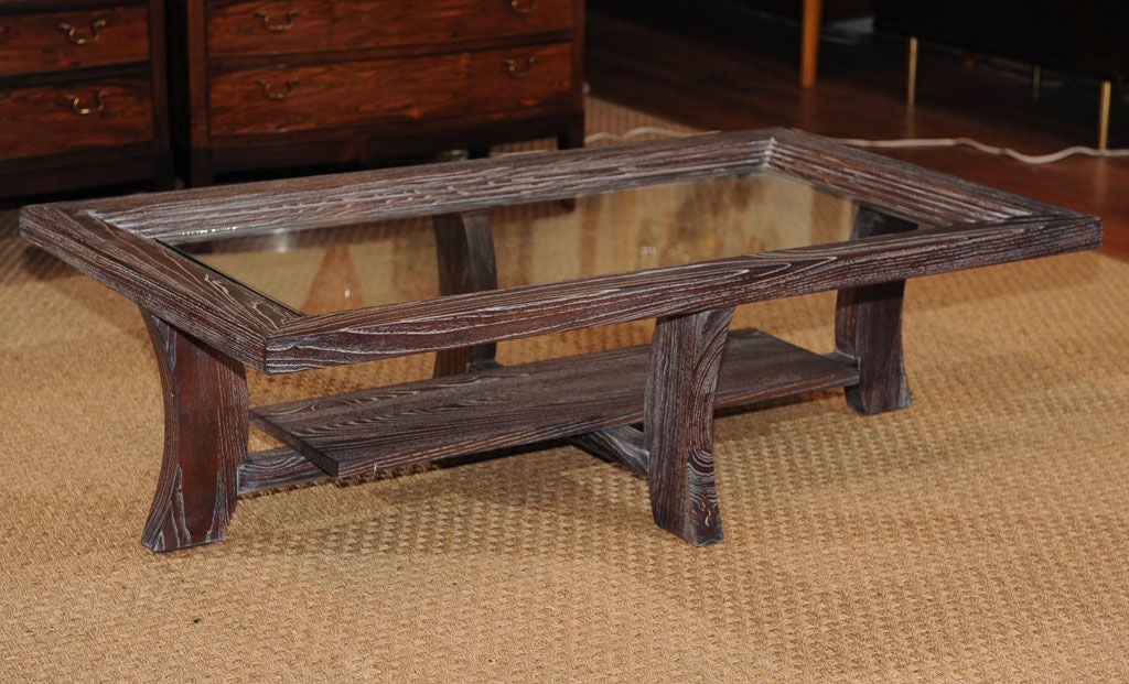 Paul Frankl design limed oak coffee table with glass top. Completely refinished with a new glass top.
