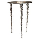 Aluminum side table with bronze finish, by Michael Aram