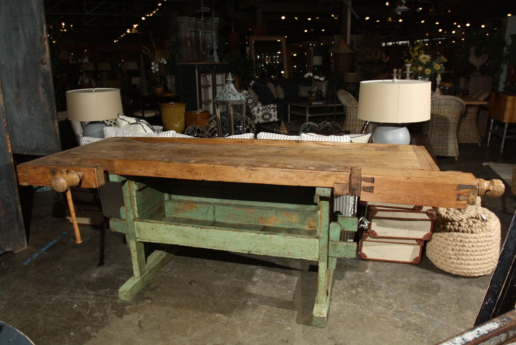 beautiful workbench on green painted base. shelf in base