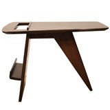 A Jens Risom Abstract Form Magazine Table.