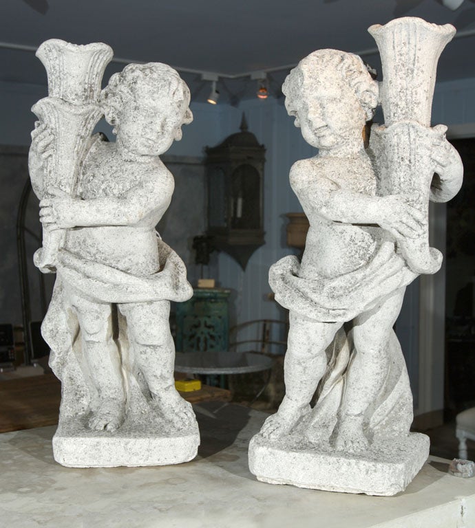 Pair of Cast Stone Putti Torchieres/Statues