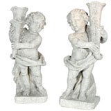 Pair of Cast Stone Putti Torchieres/Statues