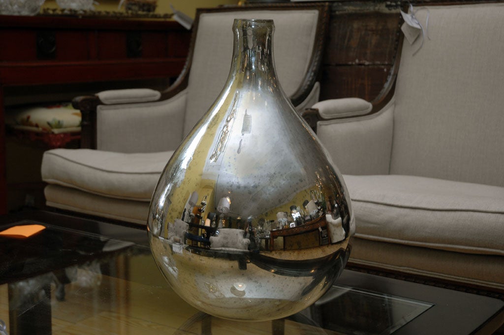 Mercury Silvered Demijohn, mouth blown glass.