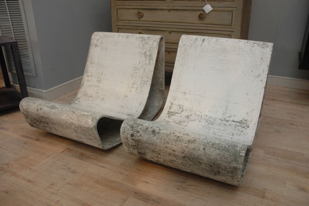 A pair of original Willy Guhl Loop Lounge chairs with incredible patina, in great condition.