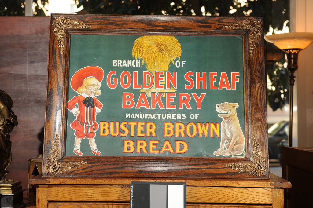 Colorful and fun tin sign advertising Buster Brown bread which we believe was located in Oakland at the turn of the 19th/20th Century.  All the writing and the figures are embossed (raised) which gives great depth to the image.  The sign looks like