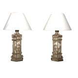 PAIR OF SILVER LEAFED CARVED ORIENTAL LAMPS