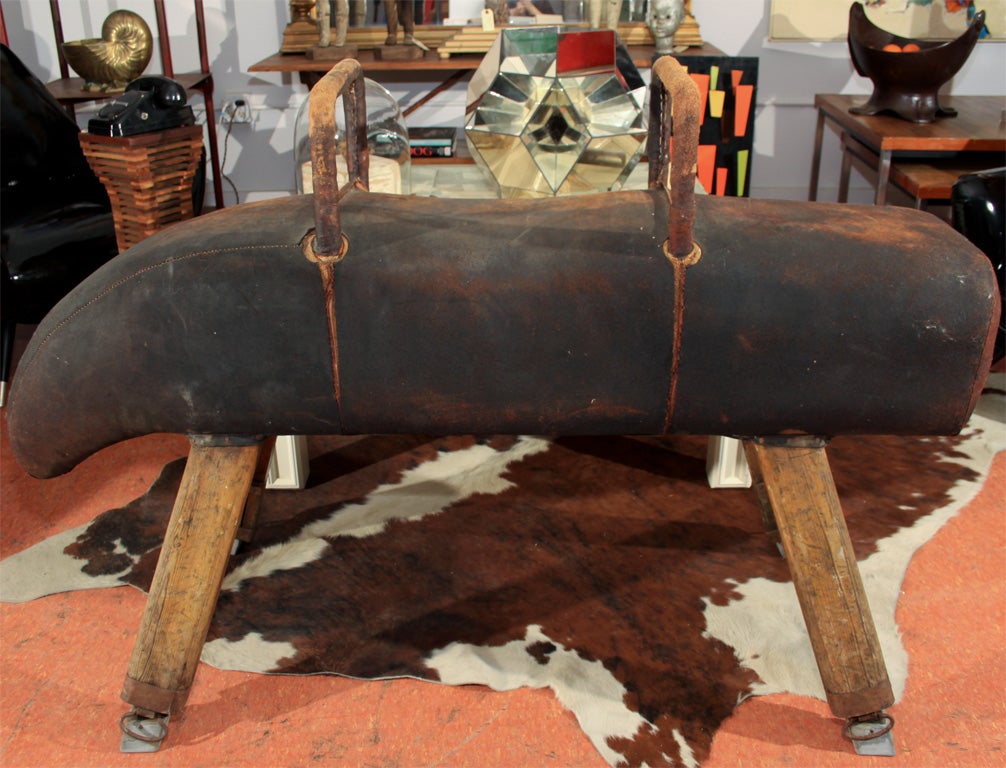 Fantastic 'Sloping Neck' Vaulting Horse, most likely a high school or collegiate piece from the reputable 19th c. Danish maker;  height-adjustable legs, upholstered in a gorgeous suede with perfectly uniform wear and deep brown patina;  extremely