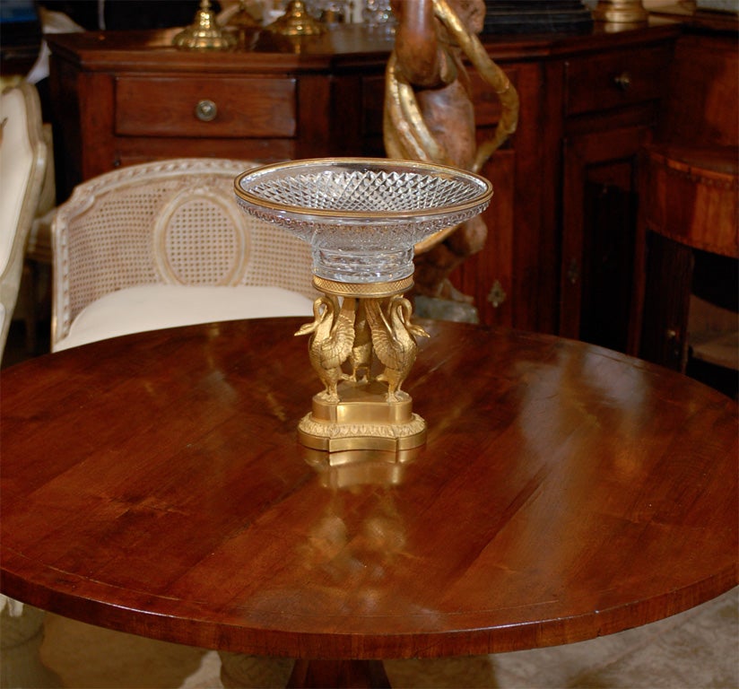 19thC FRENCH CRYSTAL AND GILT BRONZE CENTERPIECE FROM THE THOMPKINS ESTATE<br />
AM ATLANTA RESOURCE FOR FINE ANTIQUES<br />
WE HAVE A VERY LARGE INVENTORY ON OUR WEBSITE<br />
TO VISIT GO TO WWW.PARCMONCEAU.COM