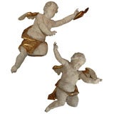 Pair of 17th Century carved wood and parcel gilt cherubs