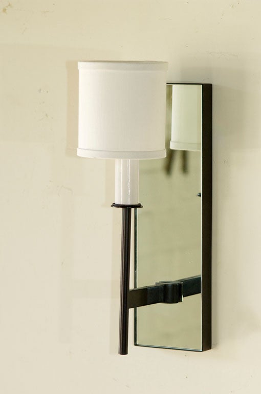 Paul Marra One-Arm Mirror Back Sconce shown in oil rubbed bronze finish.