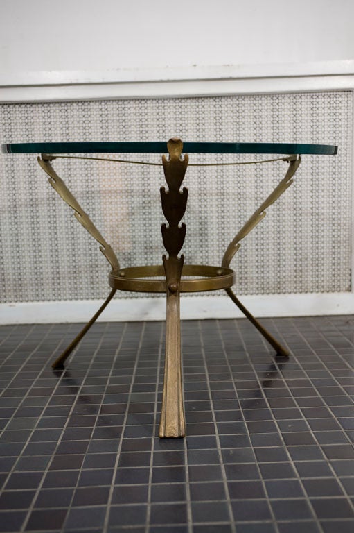 Elegant center table attributed to Maison Jansen.