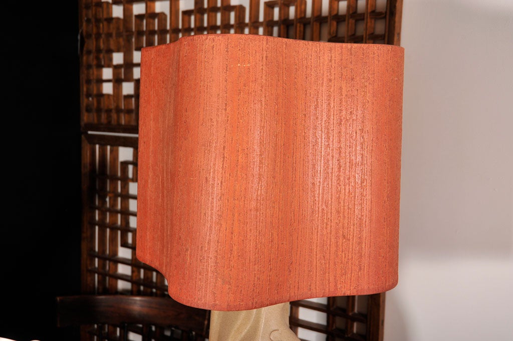 Freeform pottery table lamp by Marianna Von Allesch with its original textured, amorphic, paper shade. Wonderful organic aesthetic with a subtle glaze and incised and painted abstract motif. Signed at the base.

*total height to finial: