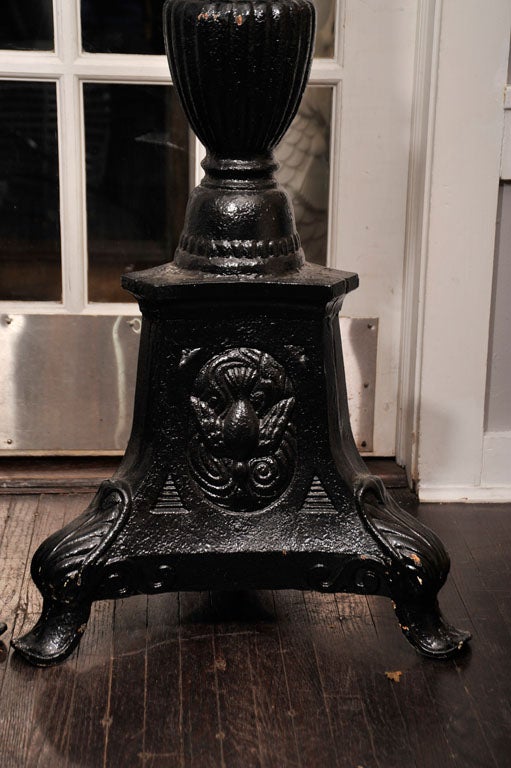 PAIR OF CAST IRON CANDLE STICKS IN BLACK FINISH