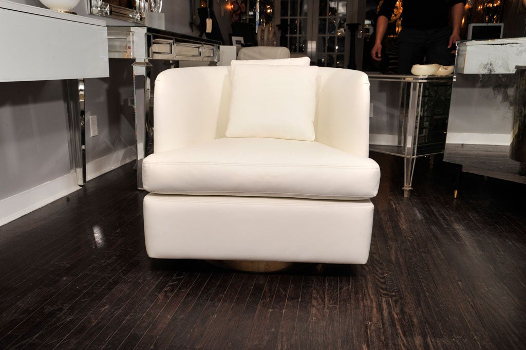 American SINGLE MILO BAUGHMAN SWIVEL CHAIR WITH BRASS BACK