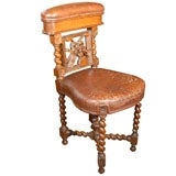 French Gambler's Chair of Carved Oak and Leather