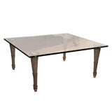 Glass top and silvered metal coffee table