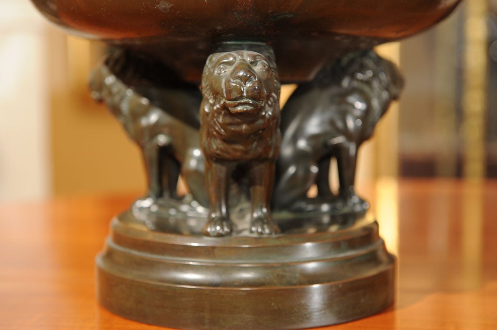 Neoclassical patinated bronze bowl with three lion base 1