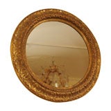 Round gilt wood and gesso mirror