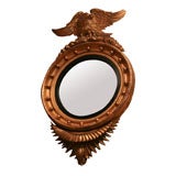 English 19th Century bulls eye mirror.