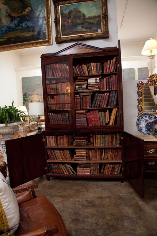 Biedermeier bookcase on top of a two solid doors cabinet 2