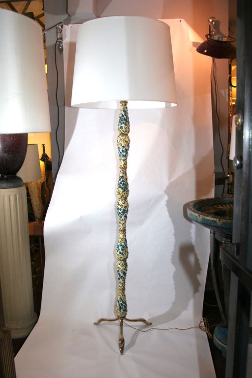 An Italian Mid Century Modern sculptural ceramic and brass floor lamp 1940's
New sockets and rewired
Shade not included