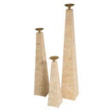 Monumental set of three Fossil Stone Candlesticks