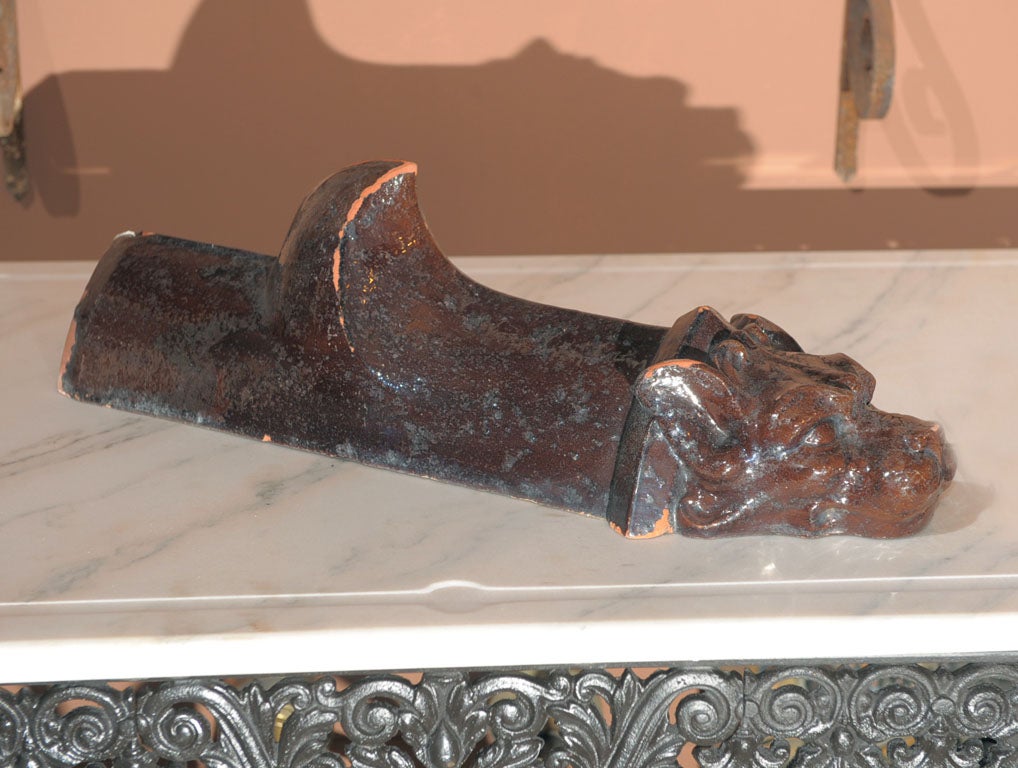 Decorative & rare brown glazed terracotta 'gargoyle' roof orniment
19th Century,  France
