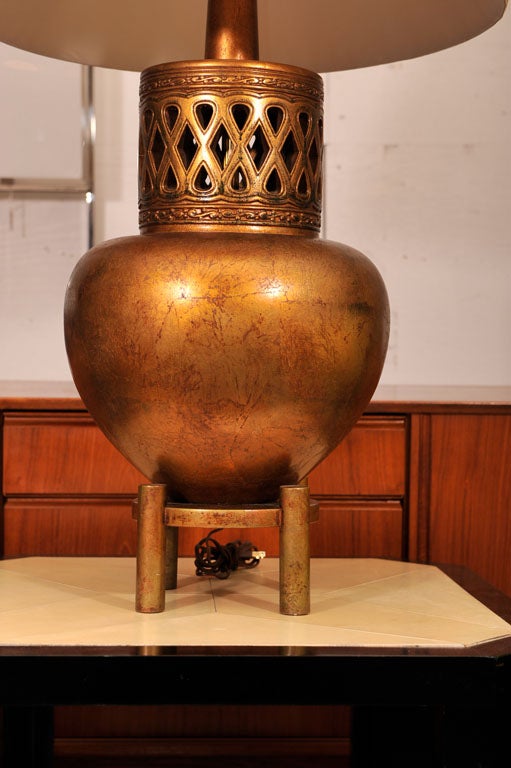 Grand and impressive gold decorative modern lamp; done in the style of James Mont. Please contact for location.