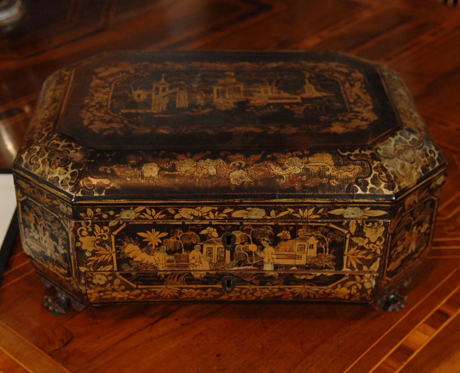 a black lacquer and gilt Chinoiserie sewing box with lift top and bottom drawer (2 keys), fully fitted interior with bone pieces, provenance states that it 