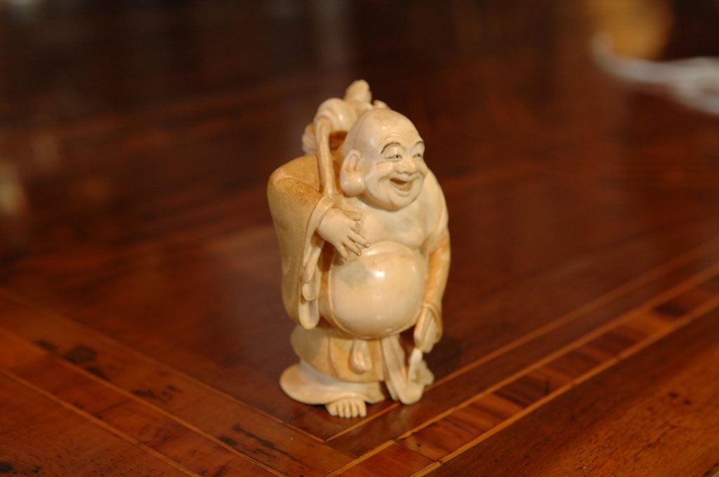 Folk Art Ivory Laughing Buddha
