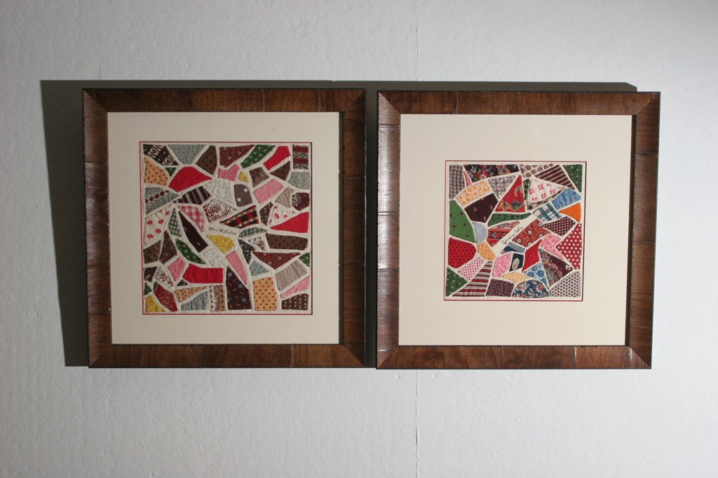 Signed, rare, hand-appliqued squares with exceptional examples of period fabrics, arranged in a 