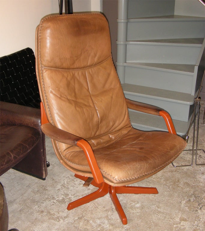 1970s Dutch armchair in wood with leather upholstery. Can tilt back.
