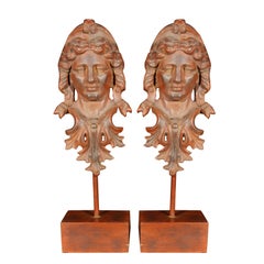 Pair of Iron Head Sculptures