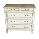 White paint decorated with gilt bachelors chest. Stamped Jansen