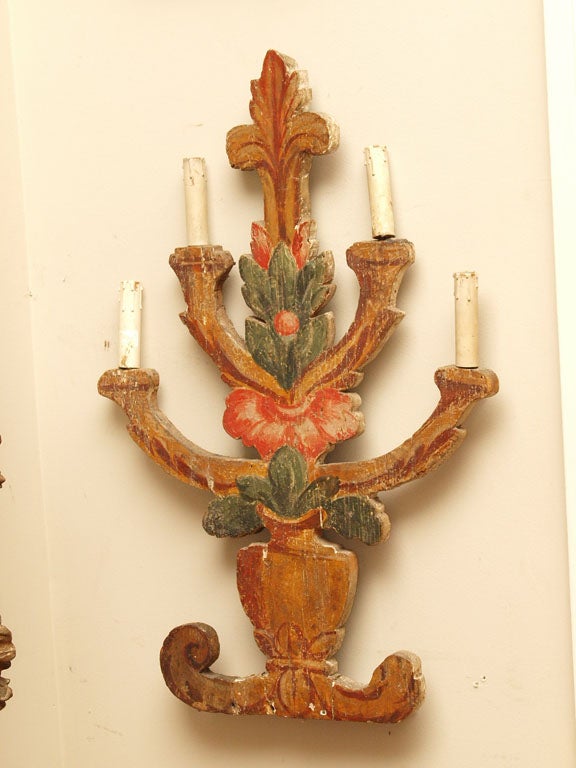 A Pair of Four Light Wall Appliques