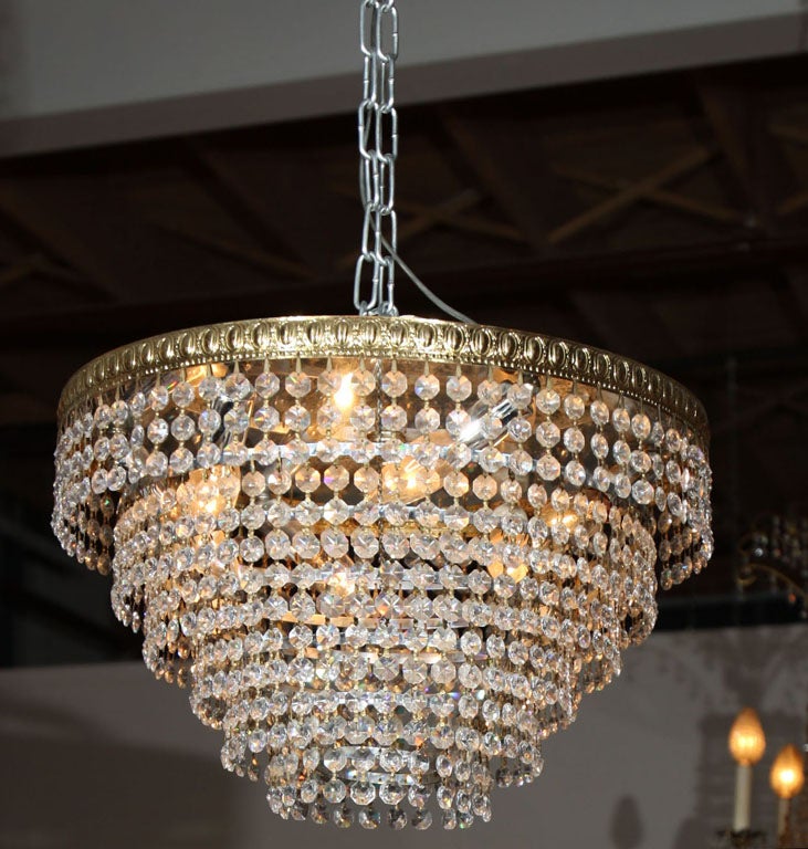 Flush Mount Crystal Wedding Cake Chandelier.  Dripping with crystals, this chandelier is sure to make an impact in any room!