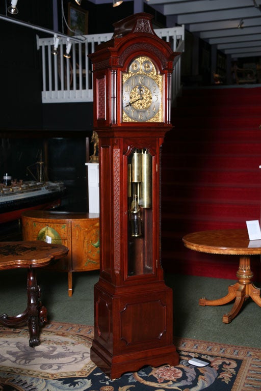 A 19th c.  Regency English Musical Longcase / Grandfather Clock in a superb mahogany case which is signed Tiffany.