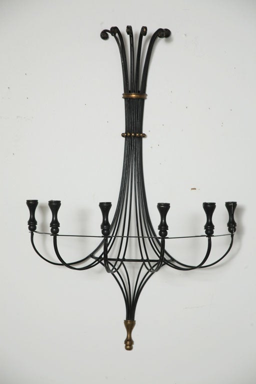 Black steel rods form calligraphic six-light candle sconces, ornamented by gilt iron and brass details. Please note: Item located at: Hamptons Antique Galleries II, 441 Canal Street, Stamford, CT 06902, t. 203.325.4019