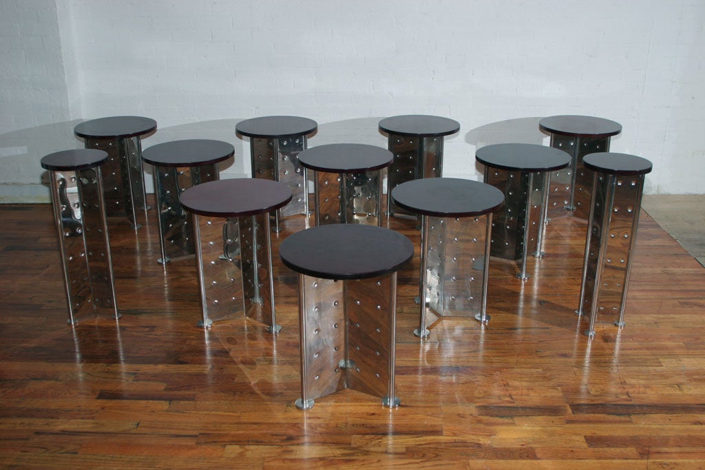 Unique and Original Extremely-Rare Set of 10 Occasional Tables, created for the Royalton Hotel New York. Constructed of structural steel and aluminum space-frames with perforations and Cherry-Stained Mahogany tabletops. Originally purchased with