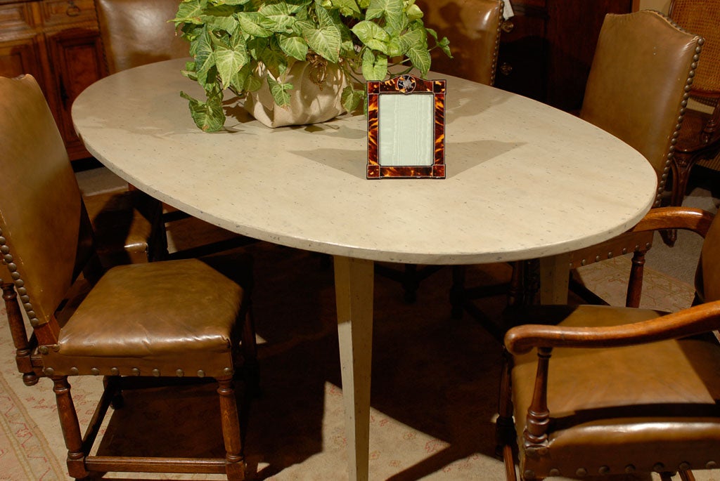 The origin and date of this frame can easily be determined by the hallmarks found on the clip on the back.  It was made in Birmingham, England in 1900 from rosewood, tortoise shell and sterling silver.  The rich dark color of the shell makes this a