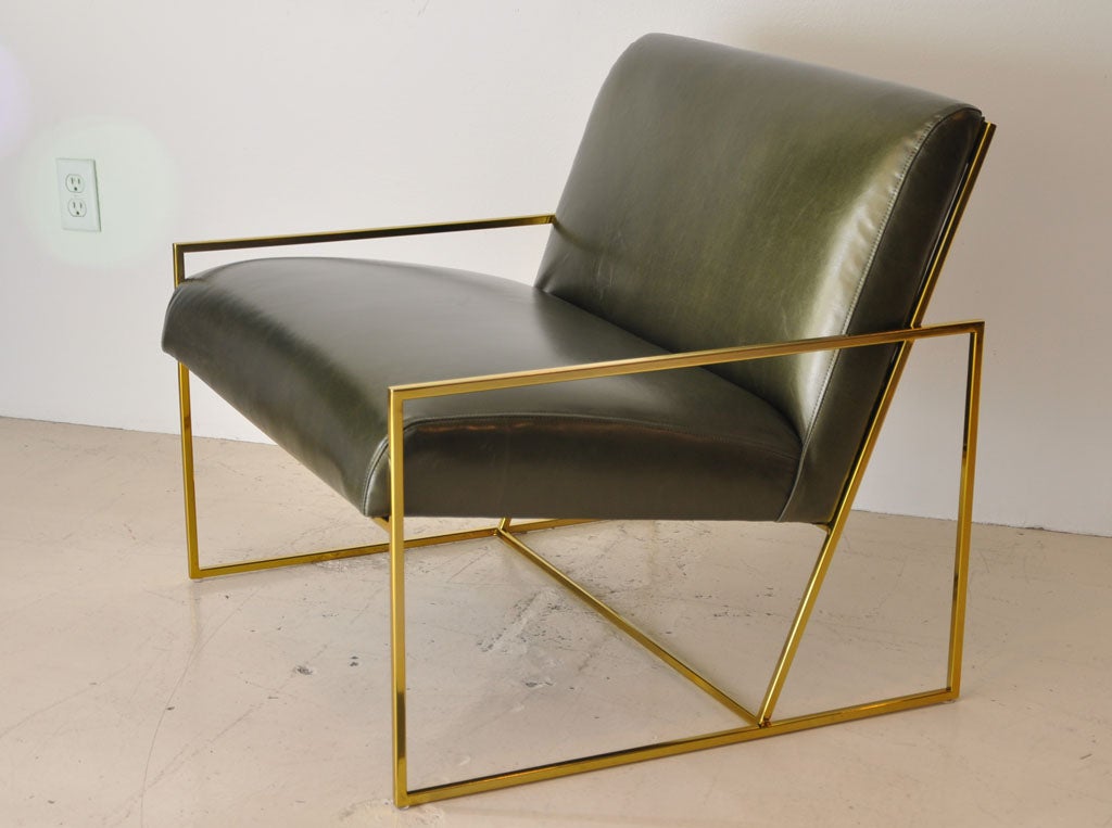 Pair of new thin-frame brass chairs in green leather.  Can be sold individually.  Also available to order COM/COL.