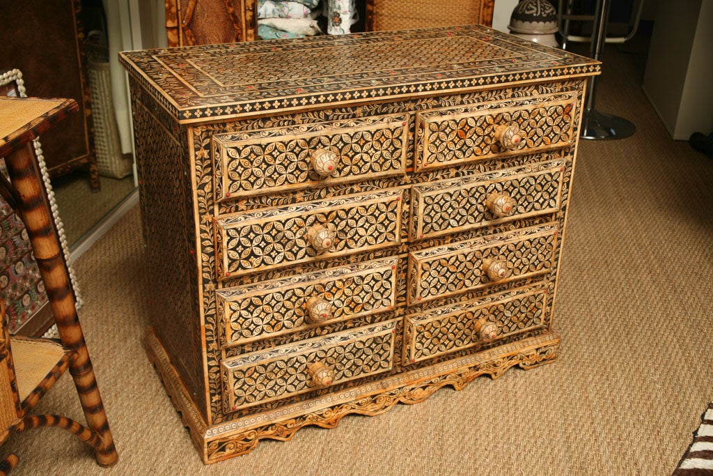 Beautiful dresser with eight drawers made of cedar wood and camel bones from the berber's tribes in the desert of the sahara.