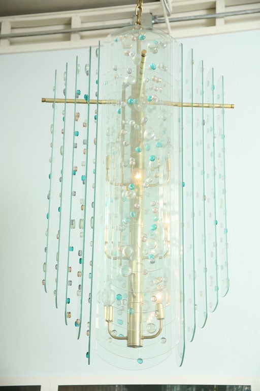 Lustre monumental en verre et laiton