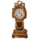 Louis XVI style pedestal clock.